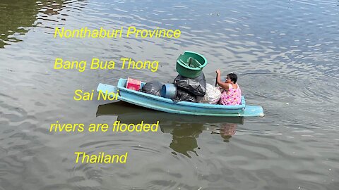 Bang Bua Thong district and Sai Noi rivers are flooded in Thailand