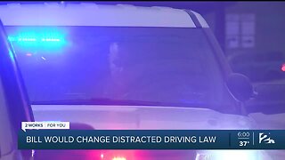Bill would change distracted driving law