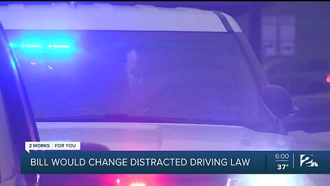 Bill would change distracted driving law