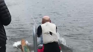 A Senior Man Goes Water Skiing