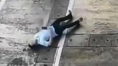 This guys sudden collapse looks strange. Was he hit by something? 5G maybe? (see description)
