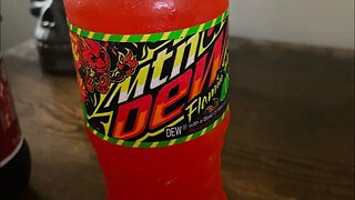 Food review~ I try the new flaming hot Mountain Dew.￼