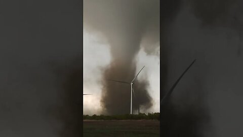 A Tornado Moves Through a Wind Farm