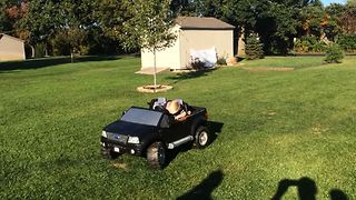 Boy Takes A Power Nap On Power Wheels