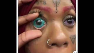 LADY TATTOO EYEBALLS BLUE AND PURPLE