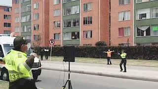 Police in Bogota give zumba classes to quarantined residents