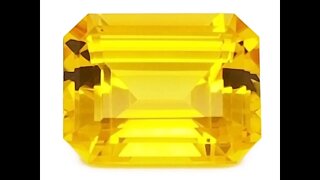 Chatham Emerald Cut Yellow Sapphire: Lab-grown yellow sapphire, medium tone