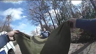 Bodycam shows police using blanket to catch kitten falling from tree