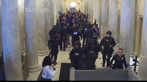 Jan. 6 police escort protesters into the Capitol building