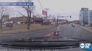 Shocking dash cam video shows toddler in car seat fall out of moving car
