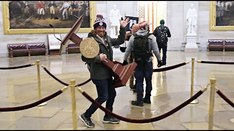 DOJ announces charges against man carrying Pelosi's podium and others in US Capitol riot
