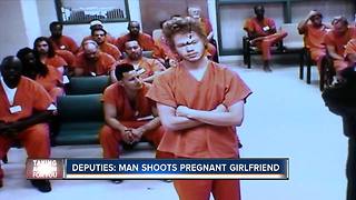 Man shoots pregnant girlfriend