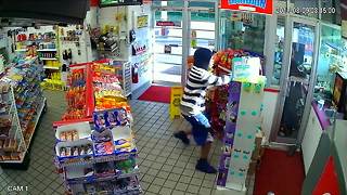 Video shows armed robbery at Raytwon gas station