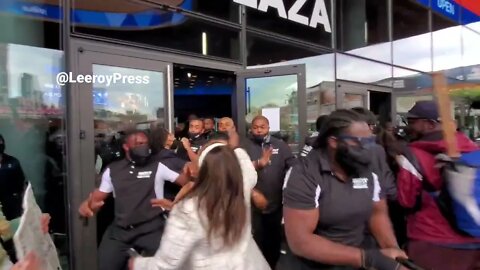 New York - Protesters In Support Of Kyrie Irving Storm The Doors Of The Barclays Center In Brooklyn