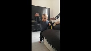 Baby boy dances to dad's drum solo