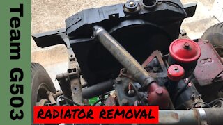 Team G503 Removing The Radiator From A 1943 Willys MB
