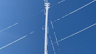 Massive chunks of ice fall from 650 foot communications tower