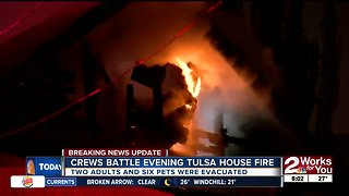 Crews battle late-night north Tulsa house fire