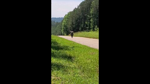 Playing on the big bike.