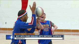Harlem Globetrotters star surprises boy with rare disease