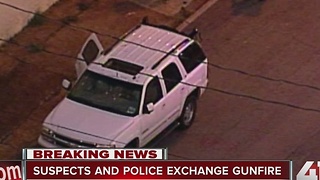 Suspects and police exchange gunfire