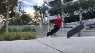 Skater's epic handrail trick fail