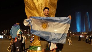 Fans outside the stadium react and celebrate after Argentina's World Cup win