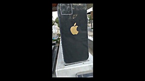 The tombstone of a mobile phone seller in Iran