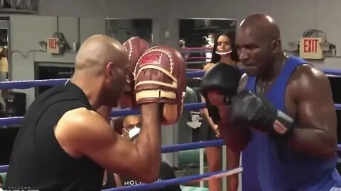 58 year old Evander Holyfield pad work before his fight with Vitor Belfort