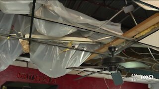 Local businesses clean up after heavy rainfall leads to further property damage