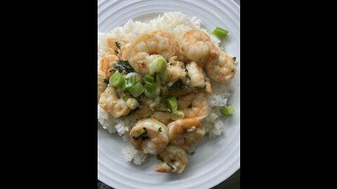 SHRIMP SAUTEED IN BUTTER GARLIC HOT PEPPERS WITH BASMATI RICE