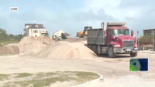 Crews restoring dunes at Bathtub Beach following Tropical Storm Eta