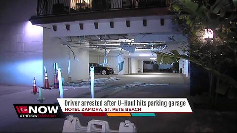 Driver arrested after UHaul collides with hotel parking garage