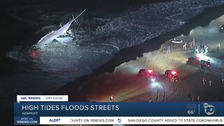 High tide floods Newport Beach streets, coastline