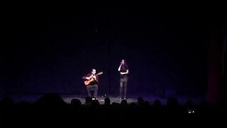 Singer singing turkish song in theatre