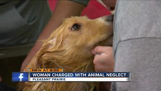 Woman charged with dog negelct