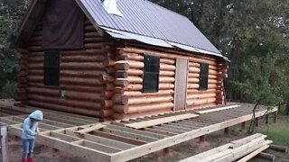 Off Grid Log Cabin Build #25c Porch Floor Joists
