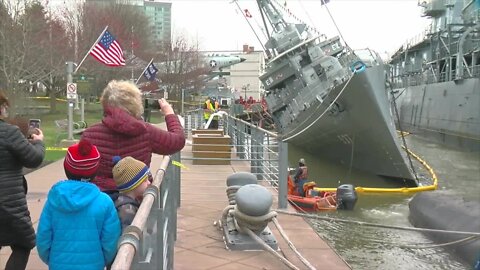Crews halt pumping water from USS The Sullivans to tackle oil in ship