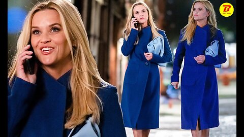 Reese Witherspoon is stylishly chic in a blue coat as she films night scenes .......