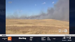 Smoke visible from the outskirts of Superior continues to billow from Boulder County wildfires