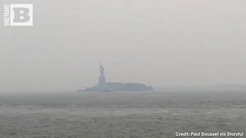 A LONELY FIGURE — Statue of Liberty Shrouded in Wildfire Smoke