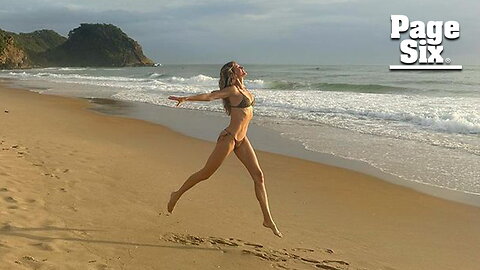 Gisele Bündchen frolics on Brazil beach in tiny string bikini
