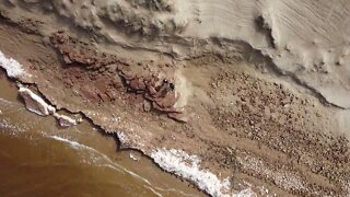 Flying Drone from Water to Beach