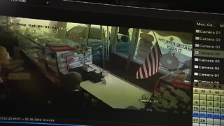 Surveillance video from inside City Donuts shows car crashing into business
