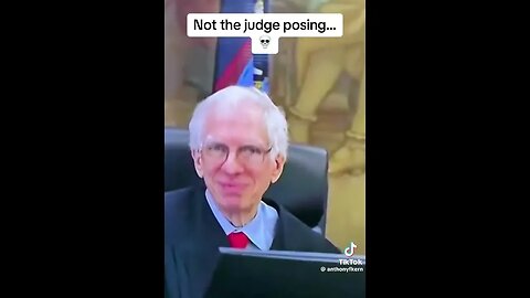 Why is the judge posing?