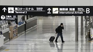 Japan Suspends New Flight Reservations As Omicron Spreads