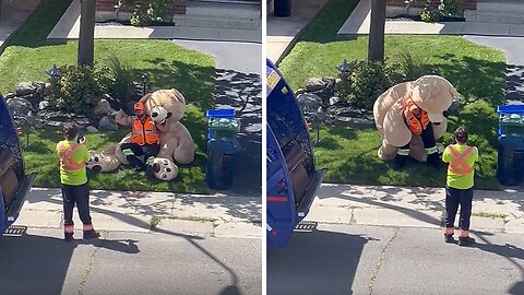 Men Collecting The Garbage Have Fun Picking Up A Giant Teddy Bear