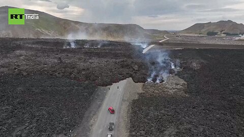 Lava flow covers road to Grindavik - Drone Footage Iceland's active volcano has stabilised since