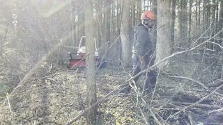 Ventrac 4500Y diesel Using power bucket to finishing rough out a trail.