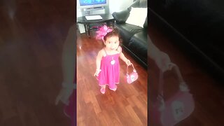 Cutie baby girl is getting ready to dance